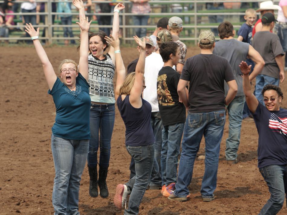 A group of girls cheer during an event at the 2015 Klickitat County Fair Rodeo.