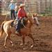 Woman rides her horse in the arena at the 2014 Klickitat County Fair.