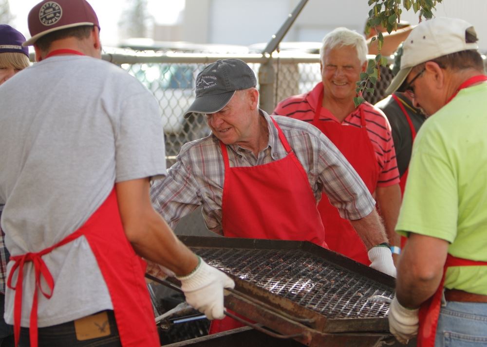 Members of the community cook food at the 2014 Klickitat County Fair.