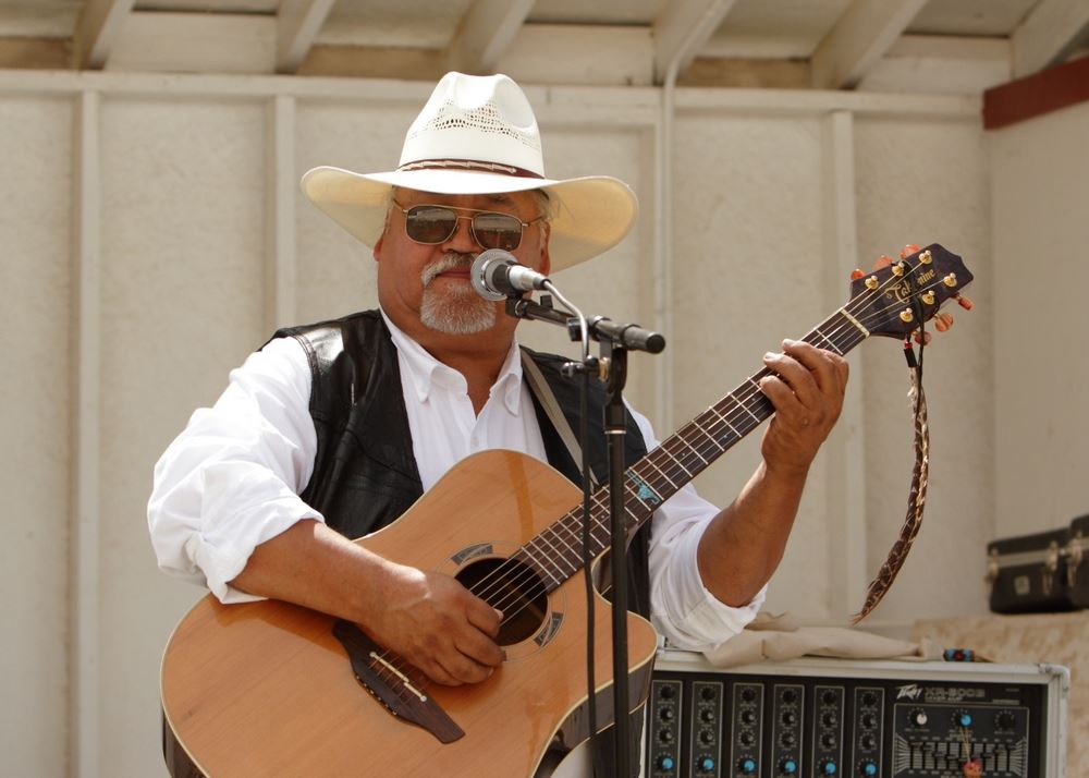 A man sings to the crowd at the 2014 Klickitat County Fair.