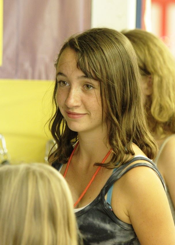 A girl smiles among the crowd at the 2014 Klickitat County Fair.
