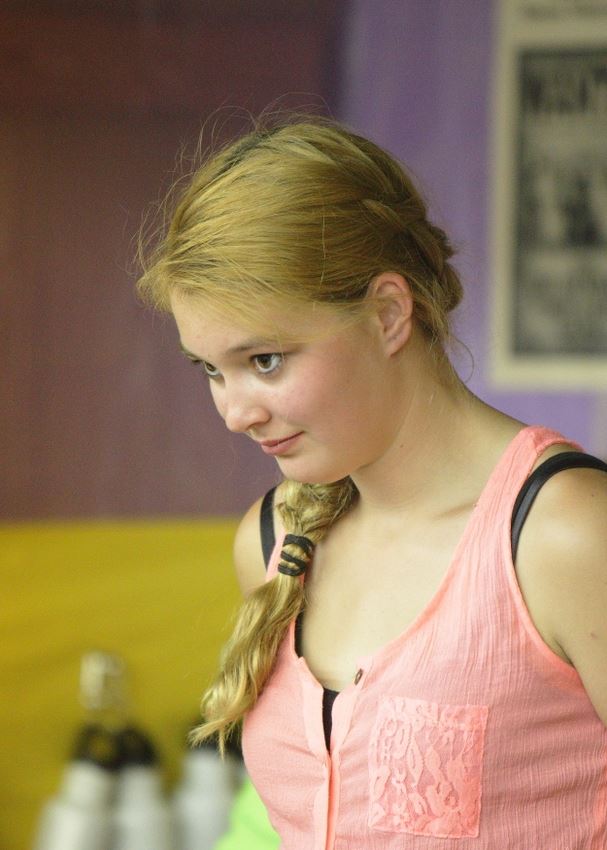 A girl works at the Waste Reduction exhibit at the 2014 Klickitat County Fair.