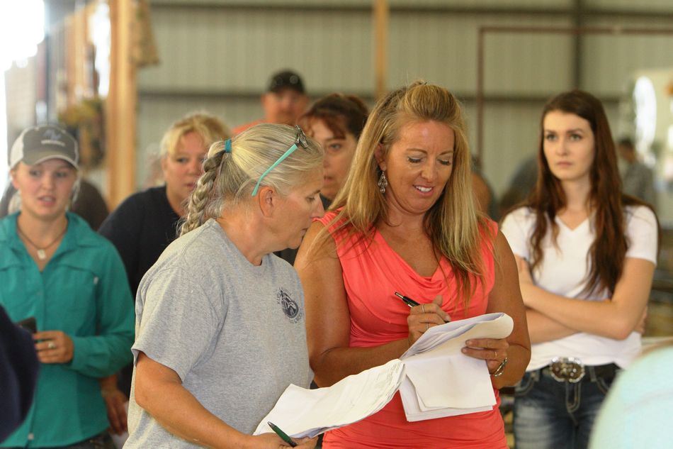 Two women enjoy themselves at the 2015 Klickitat County Fair.