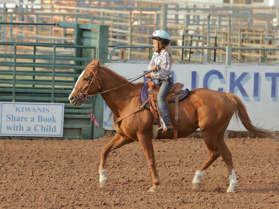 Little girl performs on her horse at the 2015 Klickitat County Fair.