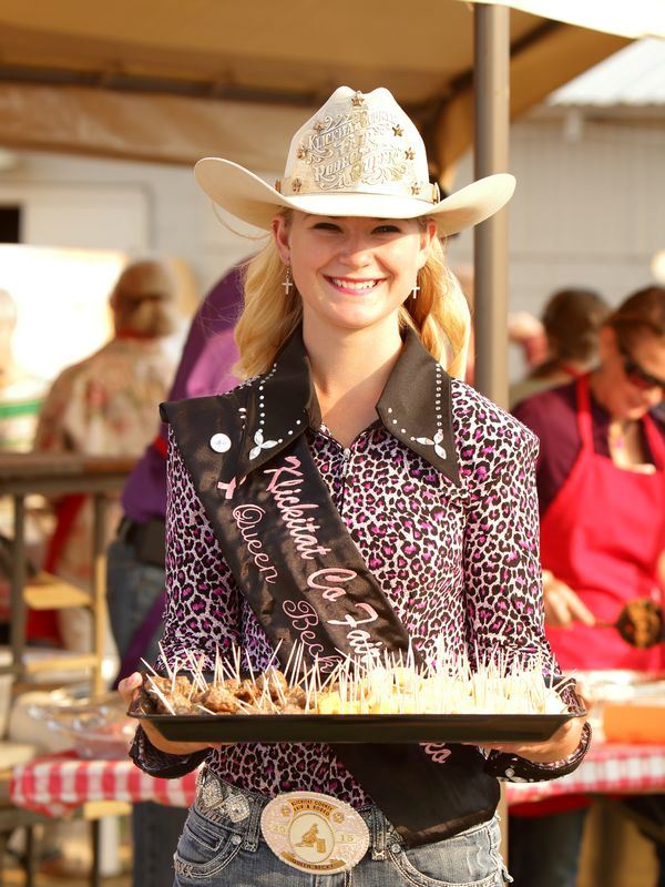 The 2015 Klickitat County Fair Rodeo Queen serves appetizers.