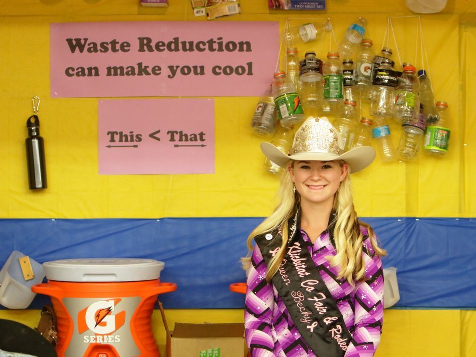 The 2015 Klickitat County Fair and Rodeo Queen at the Waste Reduction exhibit.